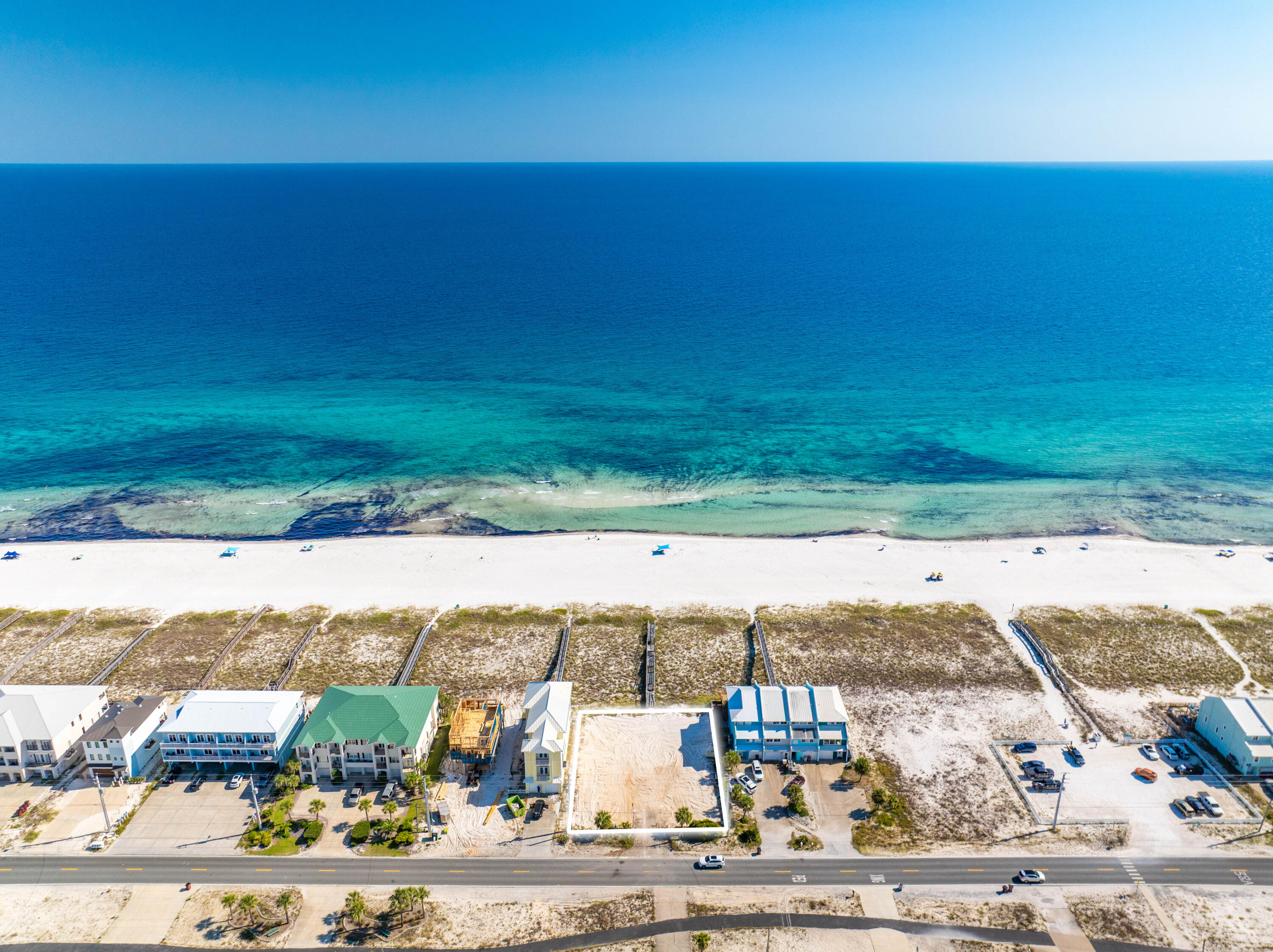 UNIQUELY RARE MULTI-FAMILY CLEARED LOT WITH 100 FT OF GULF FRONTAGE! Freshly cleared at the seller's expense, this prime parcel presents a true blank canvas along Florida's coveted Emerald Coast. With flexible development potential, the site can accommodate up to 12 condominium units, 4 townhomes, 2 spacious residences, or one extraordinary estate commanding the full 100 feet of frontage. Opportunities of this caliber are seldom available--don't let this visionary investment pass you by.