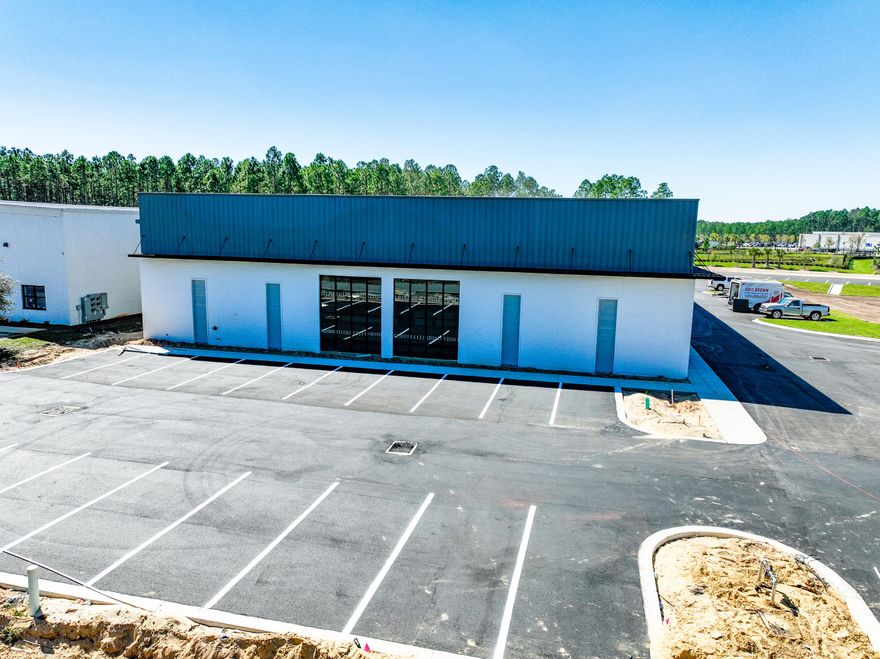 +/-5,200 square feet of a total +/-25,430 square foot freestanding building in St. Joe's South Walton Commerce Park of the flourishing Santa Rosa Beach, Florida market.  This 5,200 square foot space faces Serenoa Road with exceptional visibility and ingress and egress and an abundance of storefront glass for excellent natural illumination; also offers a large roll-up door for convenient logistics and receiving.  St. Joe's Watersound Origins and 'Bay-Walton Sector Plan' involves 20,000+ rooftops of residential density in proximity to this new development and space.  The site plan is uploaded to this listing.  This subject new development project involves Walton County, Florida parcels: 05-3S-18-16010-000-0050 AND 05-3S-18-16010-000-0060.  Ready for Occupancy November 1, 2025.