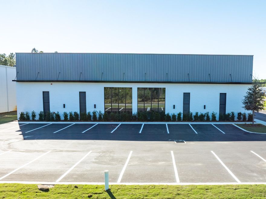 +/-5,200 SF of a total +/-25,430 SF freestanding building in St. Joe's South Walton Commerce Park of the flourishing Santa Rosa Beach, Florida market.  This 5,200 SF space faces Serenoa Road with exceptional visibility and ingress and egress and an abundance of storefront glass for excellent natural illumination; also offers a large roll-up door for convenient logistics and receiving.  St. Joe's Watersound Origins and 'Bay-Walton Sector Plan' involves 20,000+ rooftops of residential density in proximity to this new development and space.  The overall site plan is uploaded to this listing.  5,200 SF to 20,230 SF NOW AVAILABLE  +/-7,800 SF Space with Loading Dock Available.  Please inquire for further details.