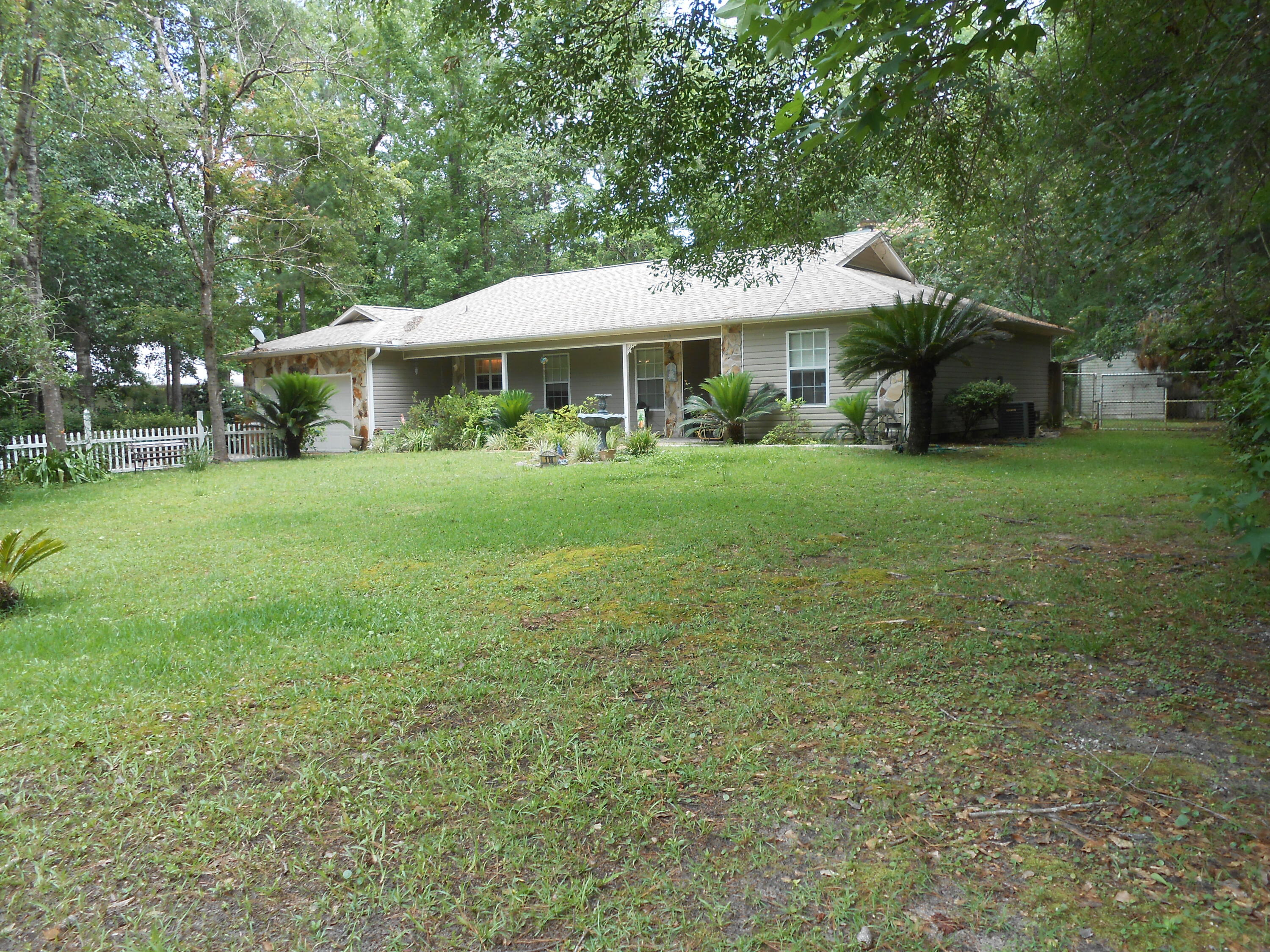 A lovely property in the Foxwood Golf Course community, which is now under City of Crestview management. The landscaping is very lovely, but the fountain does not convey. The Great room is the ''open concept'' style with kitchen, breakfast/dinning area, living room and all open for visiting. Master Bath is set for disabled persons. The screened in back porch allows for sitting in the cool of the day. The front porch is open and invites a rocking chair or two. The property is in ''asis'' status and still occupied. Please call for an appointment and allow 24 hour notice.
