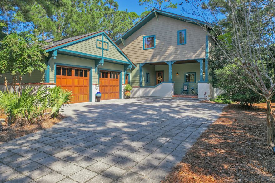 Enter the gates of Wild Heron to arrive at 1303 Salamander Trail, a lovingly designed and maintained private residence perfect for the buyer seeking respite from the crowds of 30A.Mahogany front and garage doors and accents of cedar shake siding set an impressive tone for its accompanying details: top-rated Andersen Eagle aluminum clad windows and doors, solid maple shutters and antiqued 1/2 round copper style architectural gutters. Further, the welcoming front porch with its repurposed historic brick pavers - offering over 100 years of detail - hint at the masterful features of this