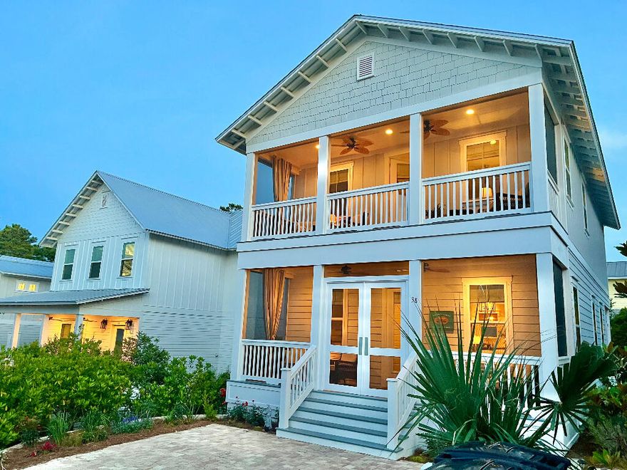 completely upgraded. Custom designer lighting with dimmers. Brass hardware on cabinetry. Hardwoods throughout. Kitchen has touch-faucet and single-vessel sink. Extra storage shelves in pantry and closets. Home has 340-sq. ft. of screened-in porch space. Large balcony off primary bedroom. Primary bath boasts oversized soaking tub. Back yard is fenced in. Home comes with fire pit attached to natural gas line. Includes air-purification system. Hardwired landscape lighting. Just a 2-minute walk to neighborhood pool. Fully furnished turnkey. Your chance to potentially own a vacation home for free.