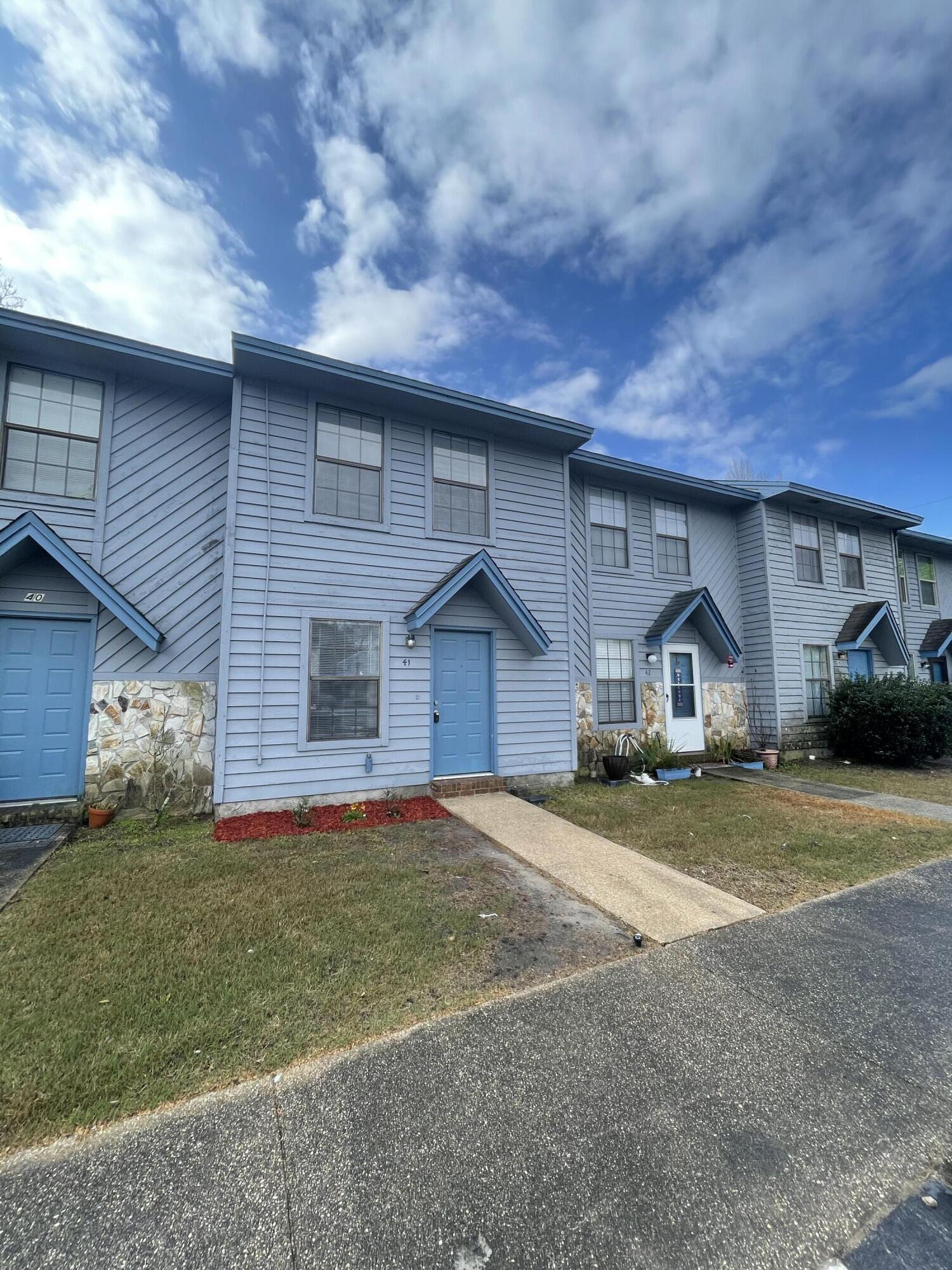 Enjoy this well-maintained, move-in ready townhome with 2 bedrooms and 1-1/2 baths!  Recent upgrades include new carpet, fresh paint throughout (ceilings and walls),new fridge, stove, fixtures, and new ceiling fans throughout. Main floor is fully tiled and consists of a living area, dining, kitchen, half-bath and spacious laundry room, with two carpeted double bedrooms and a full bath upstairs. A partially enclosed private patio leads off the dining room a' plus it's only a short walk to the sparkling communal pool and adjacent gazebos!  2.7 miles to the back gate access at Hurlburt AFB, 0.62 miles to the joint campus of University of Western Florida/Northwest Florida State University. Distance to Eglin AFB is 5 miles with Okaloosa Island 8 miles away.
