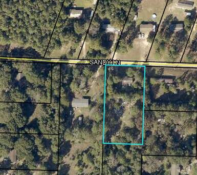 A little over an Acre of Prime land featuring big beautiful oak trees. Come Settle down in your new home. Bring your build plans today! This property features plenty of paved road frontage and is conveniently located north of town with Lots of new growth and just a short drive from local schools, hospital, south Publix, a variety of restaurants and the upcoming Crestview Commons, Hwy 85 and I-10 are in close proximity to the property.Lot. subject to county lot split approval.