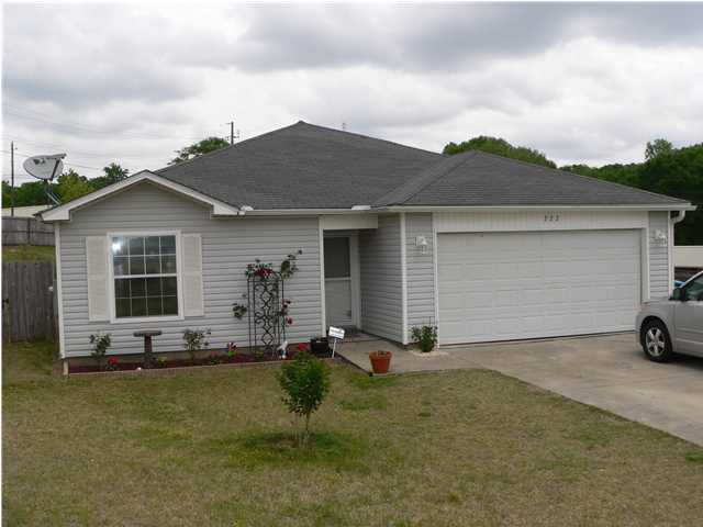 Bring a family to this great home located at the very end of the street in a cul-de-sac for safety and privacy. Don't let the SF fool you, it feels much larger with 4 bedrooms or three with a great office. This home also has a split floor plan updated wood laminate flooring throughout the home. The master bedroom has a large walk in closet. The kitchen has a breakfast bar that overlooks the great room, very nice appliances that stay with the home. New tile on floor in kitchen with new tile back splash. Huge Yard with back deck, great for those neighborhood BBQs. Two car garage to keep your vehicles out of that Florida sun. Close to schools and shopping. Don't wait, this home is a real bargain! All measurements are approximate and buyer to do their own due-diligence. PROPERTY TO BE
