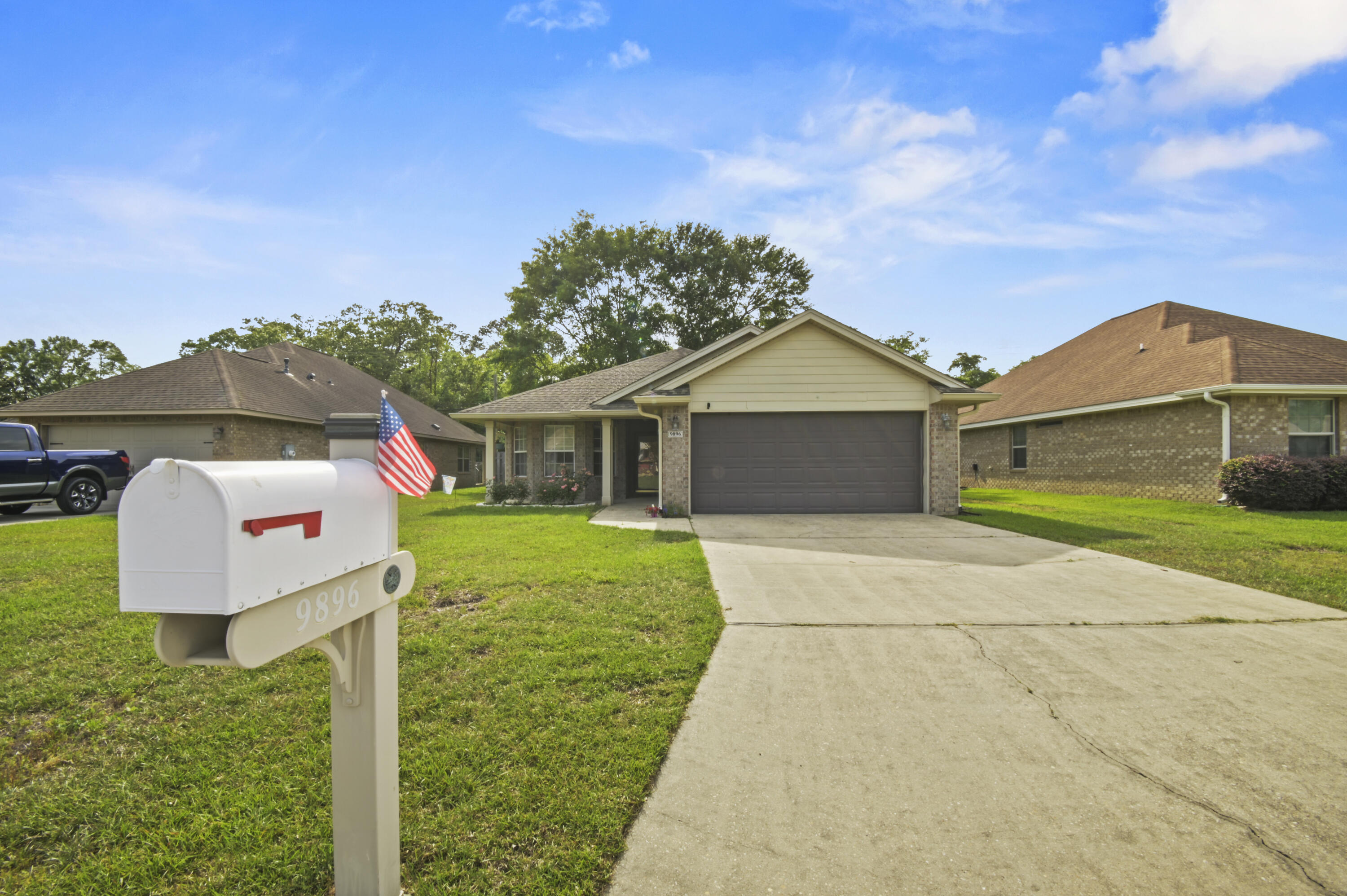 Welcome home to this lovely 3 bed / 2 bath residence with convenient access to Interstate 10, HWY 29, UWF, downtown, and many shopping centers. Upon entering, you're greeted by the open concept living/dining area with a massive vaulted ceiling, perfect for entertaining guests! Seamlessly connected to the living area is the kitchen with seemingly unlimited counter space, modern cabinetry, and stainless appliances - ideal for the family chef! Just off the kitchen is a dedicated laundry room leading to the 2-car garage. The layout offers privacy with the oversized master suite situated in the rear of the house and the additional bedrooms in the front. The master is complete with a massive walk-in closet and it's own private, en-suite bathroom. Outside relax on the large, screened patio with a cup of coffee after a long day. The property includes gutters with downspouts, hurricane shutters, and a spacious fully fenced backyard; perfect for dogs, kids, or barbecuing. Brand new roof will be installed prior to closing, keeping insurance low! Don't miss out on the chance to make this house your home!