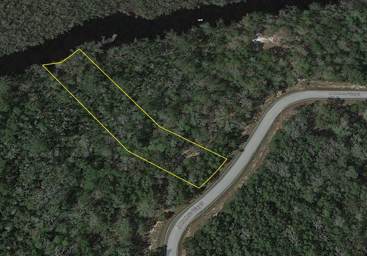 Beautiful estate size waterfront lot backing up to Godwin Creek in the gated community of Magnolia Bay Estates, a 79 lot subdivision of which 26 are waterfront, with access to Alaqua Bayou, Choctawhatchee Bay and the Gulf of Mexico. Conveniently located to the booming town of Freeport, Hammock Bay, shopping, restaurants and only 20 minutes to Hwy 30A and the crystal sandy beaches of the Gulf of Mexico. Water, sewer tap, and utilities are at site ready to build the house of your dreams. Additional waterfront lot is available. All Information is deemed reliable but not guaranteed with the buyer to verify. Seller financing with flexible terms is available with adjusted pricing. Craft two home sites for your family or keep the other lot as an investment. You must visit these properties in person to take in the beauty of the vista. Erect a dock on Goodwin Creek and launch your boat or drop a fishing line to while away the day and maybe catch dinner. Perfect Location, Exceptional Investment Opportunity. Situated in a quiet, tranquil neighborhood, these properties are investor's dream.
Convenience Amidst Nature's Best
Only 7-10 mins from downtown Freeport and close to the following points of interest:
Dining/Restaurants: 7-15 minutes - Bubba Jacks, Taco Bell, Waffle House, McDonalds, El Jacalito Mexican Restaurant, Dairy Queen Grill & Chill, Li's Hot Wok Chinese Buffet, The Oar House & Oyster Bar
Historical Landmarks/Parks/Recreation: 5-10 minutes - Old Town Freeport, The Heritage Center of Freeport, Harry A. Laird Park, Prospect Park, Riverwalk Landing Cottages & RV Park, Fisherman's Boatyard, Alaqua Watersports, Chain Dragon Disc Golf Course, Freeport Regional Sports Complex
Supermarket: 8-10 minutes - Publix
Beaches: 30 minutes - Blue Mountain Beach, Grayton Beach
Hardware and Auto Parts Stores: 10 minutes - Ace Hardware, O'Reilly Auto Parts, Advance Auto Parts, B & M Tire Center
Schools: 5-10 minutes - First Steps Learning Academy, Freeport Middle School, Freeport Elementary School
Storage Facilities: 6-12 minutes - Move It Self Storage, Freeport Mini Storage