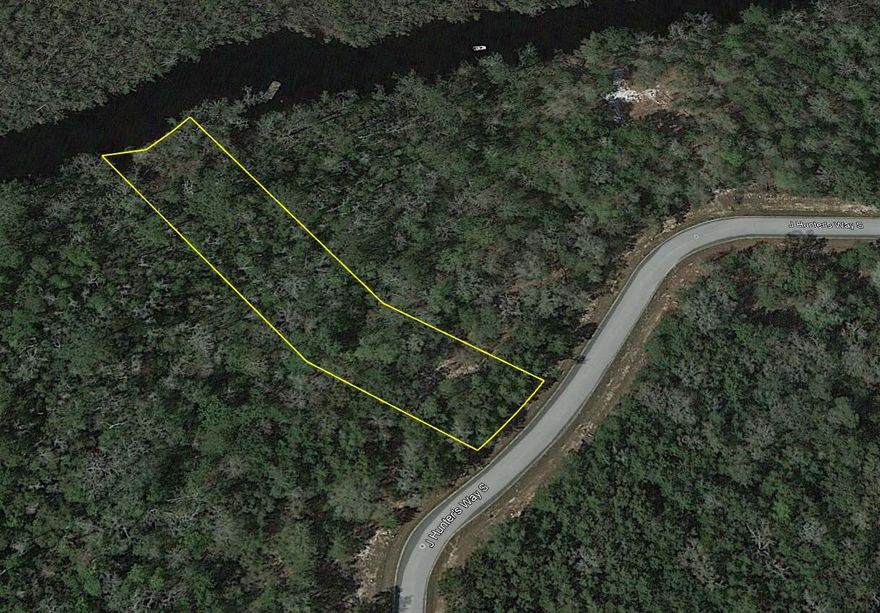 Beautiful estate size waterfront lot backing up to Godwin Creek in the gated community of Magnolia Bay Estates, a 79 lot subdivision of which 26 are waterfront, with access to Alaqua Bayou, Choctawhatchee Bay and the Gulf of Mexico. Conveniently located to the booming town of Freeport, Hammock Bay, shopping, restaurants and only 20 minutes to Hwy 30A and the crystal sandy beaches of the Gulf of Mexico. Water, sewer tap, and utilities are at site ready to build the house of your dreams. Additional waterfront lot is available. All Information is deemed reliable but not guaranteed with the buyer to verify. Seller financing with flexible terms is available with adjusted pricing. Craft two home sites for your family or keep the other lot as an investment. You must visit these properties in person to take in the beauty of the vista. Erect a dock on Goodwin Creek and launch your boat or drop a fishing line to while away the day and maybe catch dinner. Perfect Location, Exceptional Investment Opportunity. Situated in a quiet, tranquil neighborhood, these properties are investor's dream. 
Convenience Amidst Nature's Best
Only 7-10 mins from downtown Freeport and close to the following points of interest:
Dining/Restaurants: 7-15 minutes - Bubba Jacks, Taco Bell, Waffle House, McDonalds, El Jacalito Mexican Restaurant, Dairy Queen Grill & Chill, Li's Hot Wok Chinese Buffet, The Oar House & Oyster Bar
Historical Landmarks/Parks/Recreation: 5-10 minutes - Old Town Freeport, The Heritage Center of Freeport, Harry A. Laird Park, Prospect Park, Riverwalk Landing Cottages & RV Park, Fisherman's Boatyard, Alaqua Watersports, Chain Dragon Disc Golf Course, Freeport Regional Sports Complex
Supermarket: 8-10 minutes - Publix
Beaches: 30 minutes - Blue Mountain Beach, Grayton Beach
Hardware and Auto Parts Stores: 10 minutes - Ace Hardware, O'Reilly Auto Parts, Advance Auto Parts, B & M Tire Center
Schools: 5-10 minutes - First Steps Learning Academy, Freeport Middle School, Freeport Elementary School
Storage Facilities: 6-12 minutes - Move It Self Storage, Freeport Mini Storage