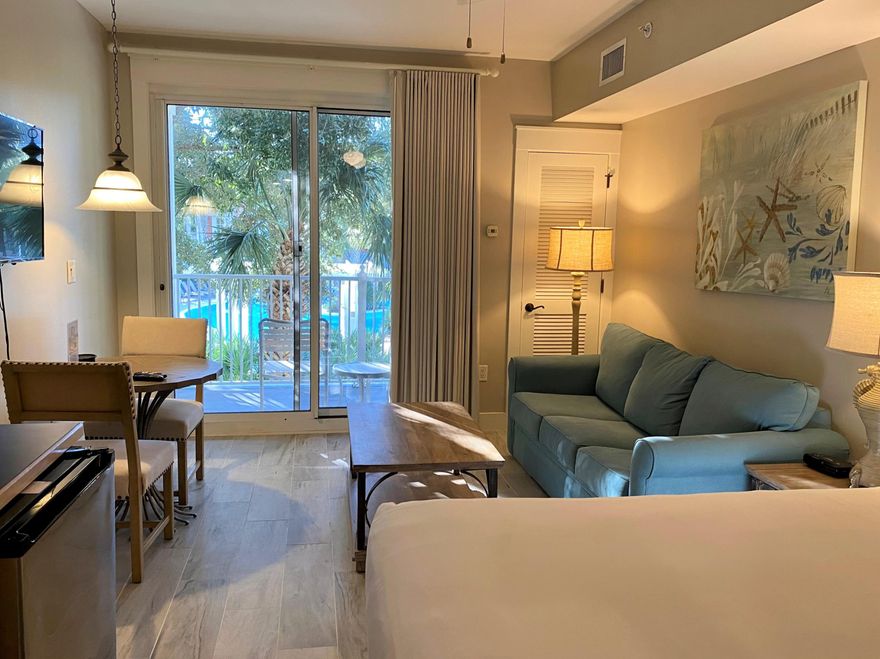 Overlooking the wonderful amenity terrace is this charming 4th floor, fully furnished studio. Equipped with a kitchenette, king size bed, and sleeper sofa to accommodate extra guests this resort home is perfect for a relaxing weekend getaway. Pilot House owners have exclusive access to the fabulous previously mentioned amenities terrace featuring a resort style pool, hot and cold spas, fitness center, activities lawn, and grilling area with seating. Not to mention access to the Founders Club, featuring a game room with pool table and bar and a balcony overlooking the events plaza. This unit is nestled right in the inviting Village of Baytowne Wharf, meaning practically instant access to several restaurants and shops. So much to love already!