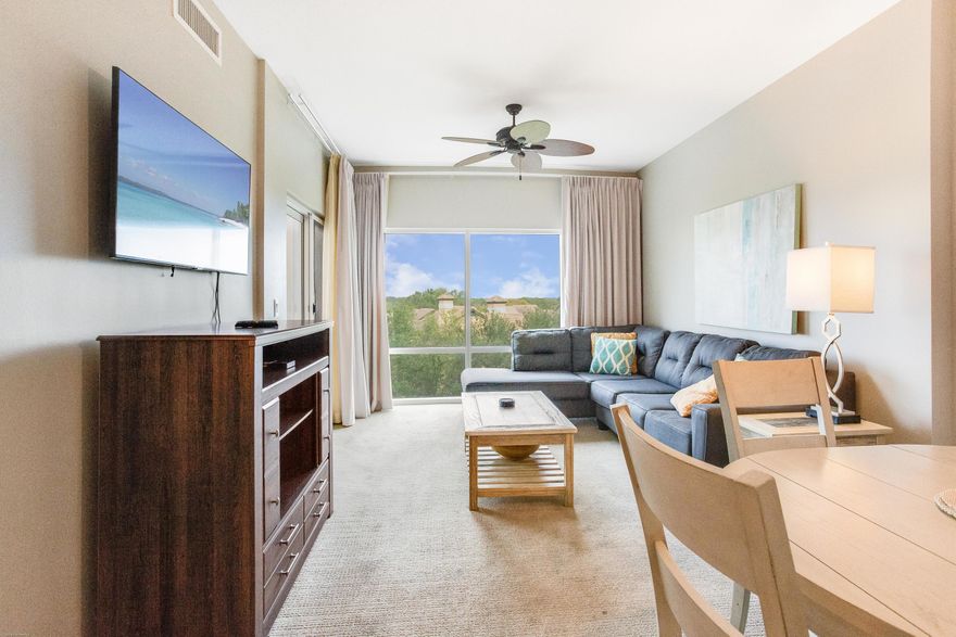 Escape reality in this 1-bedroom condo located in Luau I. After spending the day at the beach or lounging around the lagoon-style pool, relax on the private balcony overlooking the Luau pool, Baytowne Golf Course and resort from this 4th floor unit. Perfect for Sunsets 365 days a year! The large sectional in the living area provides ample space for the whole family to enjoy a movie. Get a good nights sleep in the Master Bedroom's king size bed and check the weather from the large window before getting ready for the day. Luau owners and guests enjoy the use of the lagoon-style pool featuring a grotto waterfall, palm trees, loungers, and seasonal tiki bar. Owners and guests also enjoy a private pathway to the beach, fitness center, owners storage cage, and covered garage parking.