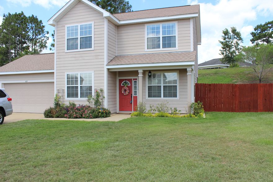 South of I-10 and better than new! This 3 bedroom 2 1/2 bath has been updated throughout. Features include: 20'' Porcelain tile throughout 1st floor and carpet installed upstairs. Newer Dual A/C's, Hunter ceiling fans in all bedrooms, and updated lighting. A beautiful backyard with a 20X20 patio makes for enjoyable outside entertaining. Come and see for yourself...you will not be disappointed!