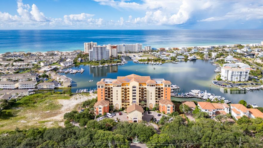 This beautiful unit with a clear Gulf View is looking for a new family. Located high up on the seventh floor, the views from the balcony encompass the Harbor, Gulf and the Pass. Beautifully styled touches are located throughout, including an electric fireplace that adds ambiance to chilly winter evenings. This lovely condo conveys fully furnished, as viewed with just a few named minor exceptions. The large balcony features a built-in electric grill and views for miles! Two conveniently located parking spaces convey, along with a large storage room on the seventh floor. Marbella is also home to Marbella Yacht Club. A 15 x 30 slip is available as a separate purchase. MLS # 955387 Marbella exudes luxury from the grand front entrance to the gorgeous Harbor front pool. Conveniently located across from the new Publix, with easy access via the water taxi to all of Destin Harbor entertainment, this quiet complex is an escape from the rush of tourist folks! Marbella features a large conference room as well as a nicely equipped fitness room. 