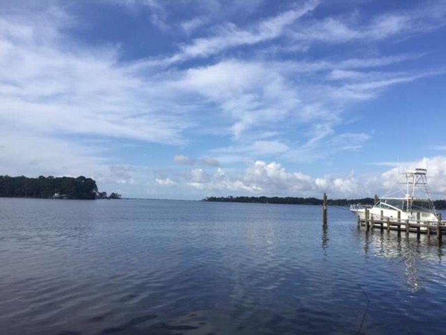 Large waterfront lot situated on Rocky Bayou - 3/4 acre with 150 feet of waterfront!! Lot faces South/South West. Expansive view of Rocky Bayou, Bluewater Bay area and across Choctawhatchee Bay towards San Destin. Open water (no bridges) all the way to Destin Bridge. Deep water for larger watercraft. Sloping lot provides higher building elevation with enhanced view and storm surge protection. Lot is on quiet cul de sac. Close to everything: Eglin AFB, schools, churches, shopping, and recreation. Easy to see. Just drive up and walk down to the water thru tall and stately pine trees. Boundary Survey and Elevation Certificate available.