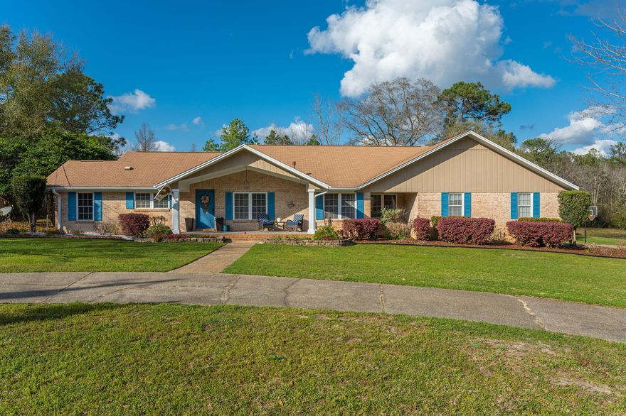 NEW FLOORING IN MAIN AREAS, NEW APPLIANCES, NEW CABINETS, NEW COUNTERTOPS (kitchen), NEW SEPTIC & DRAINFIELD, HOT WATER HEATER & HVAC ARE NEWER, Oh did I mention BRING YOUR FISHING POLES! 2 PRIVATE PONDS w/over 2 acres in Grandview Heights on a cul-de-sac location.  This beautiful home has a covered front porch, large open deck for entertaining w/awning & covered deck. Vaulted ceiling great room has gas fireplace, bay window dining area, walk-in pantry, breakfast bar, split bedroom plan w/sliding barn door leading to office area & bedrooms 2&3 with Jack & Jill bath. Owner's suite is spacious, bathroom has oversized tiled shower, double vanities, walk-in closet and reach in closet, 1/2 bath plus storage closets off great room.  Grandview boasts 55AC of lakes/park for residents to enjoy!