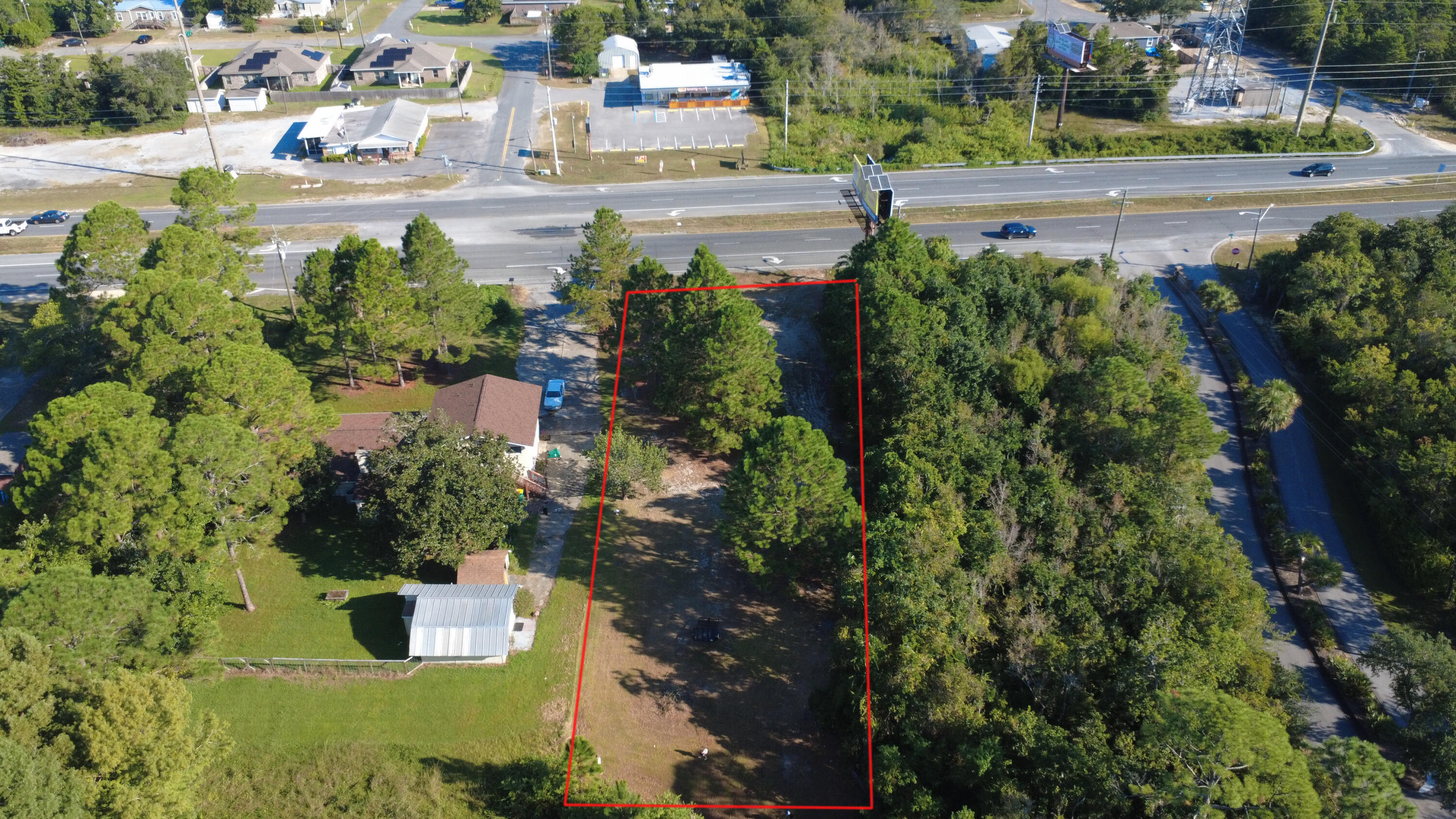 Prime Residential/Commercial Lot - 0.56 Acres in Mary Esther, FL | Highway 98 Frontage - Incredible opportunity for investors and developers! This 0.56-acre vacant lot is ideally located along Highway 98 on the west side Mary Esther, offering high visibility and easy access to local amenities, the beach, and surrounding communities. Zoned SR (Suburban Residential) with permitted uses under R-2, C-1, and C-2, this property provides a flexible range of development options, including multi-family dwellings, professional offices, retail, and more. The seller has preliminary plans drawn for two charming rentable cottages, making this an excellent investment for short or long-term rental income. With utilities nearby and flat, buildable terrain, the lot is ready for development. Whether you're looking to build cozy cottages for rentals, professional offices, or a mixed-use development, this versatile lot offers limitless potential in a growing coastal community.
Don't miss this rare find! Schedule a showing or request more information today!