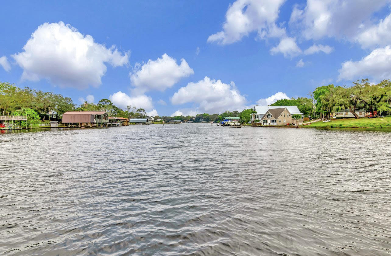If you love waterfront lifestyle this is the property for you. Enjoy Kayaking and fishing off the new dock, or hop in the pool over looking the open Bay. Boats slips for you boat and boat storage parking are offered. The property is a short drive to the beautiful Gulf of Mexico beaches as well. 2 bedrooms and 2 full bathrooms, great for accommodating guests. Ceramic Tile throughout, updated paint, this property comes furnished. This unit has its own washer and dryer installed. Courtyard grilling is available. No-Short term rentals allowed.