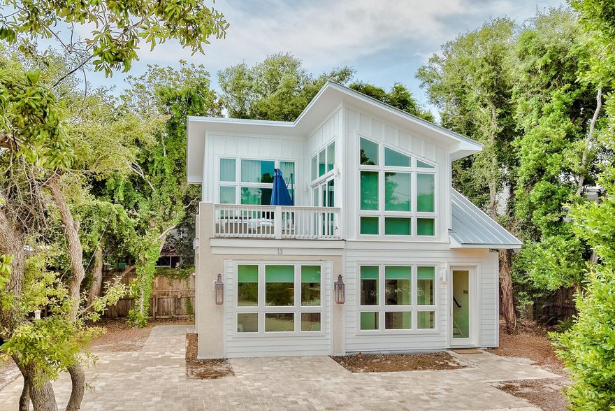 Endless opportunities exist at this Gulf-View property in the heart of 30A in Old Seagrove. Situated directly across 30A from the Gardenia Street beach access, 13 Gardenia Street consists of two homes - a two bedroom home built in 1976 on the southside fronting 30A with Gulf views and a modern two bedroom home built in 2020 on the northside of the property. A buyer has the option of using both homes as they currently exist or they could rebuild a larger home in place of the home on the southside to take full advantage of the Gulf views and keep the 2020 build on the northside as a proper guest house and a home to use during construction of the larger home. The home on the northside completed in 2020 by Borges Brooks Builders features a large open living, kitchen, and dining space upon entering the home with a half bath and lockout closet on the first floor as well. The kitchen features a large butcher block island, gas range, and ample storage space. The master bedroom and guest bedroom are both upstairs along with a large second floor deck with access from the master bedroom. For convenience, the washer and dryer are also located on the second floor with the bedrooms. A separate driveway has space for 3 vehicles.

The southside home with Gulf views has storage, a laundry room, and unfinished space on the first floor. Moving upstairs, the spacious second floor deck offers gulf views and leads you into the open living, dining, and kitchen space with two bedrooms and a full bathroom. 

This is a rare opportunity in Old Seagrove - easy beach access directly across 30A, 1.1 miles to Seaside, and walking distance to many of the great restaurants that 30A has to offer. 
