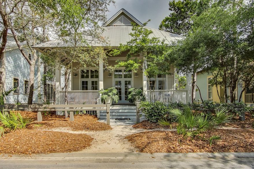 Sweet Watercolor home offering 3 bedrooms with additional Bunk Room and 3.5 Baths. Enjoy open concept living, a spacious gourmet kitchen, wide-plank wood floors, and master bedrooms on each level...plus the convenience of Camp Watercolor's amenities only steps away. Designer renovations completed within past 2 years  include custom drapery & rods, 3in. wood plantation shutters, marble counter tops, GE profile stainless steel appliances, cabinets, hardware, light fixtures, gas fireplace, luxurious soaking tub, and a total repaint inside and out. High ceiling, tall windows, and spacious porches provide an open feeling and plenty of room for gatherings. . This beautiful home is sold fully furnished/rental ready including Golf Cart.  Income projection approximately 95,000 a year.