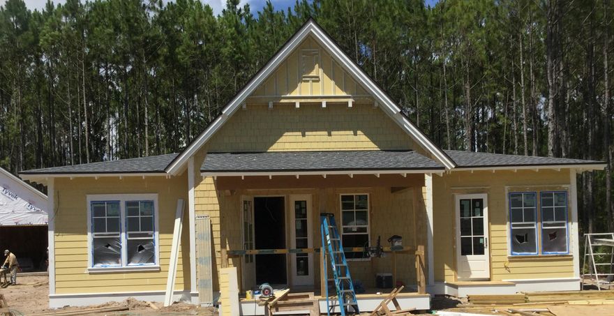 The Guilford floor plan offers 2650 Sq. Ft. and a spacious great room that opens up to the kitchen that conveys a WOLFE / SUBZERO appliance package. The 2 covered porches provide a welcoming place for entertaining. The main hall connects to 2 bedrooms, both of which have their own full bath. The master bedrooms features 2 walk in closets. The Guilford floor plan is a beautiful home for making memories and friends