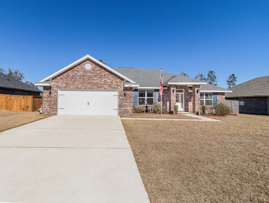 SELLER CREDIT OF $10,000! This beautiful 4 bedroom 3 bath open floor plan home is located in Milton Florida. Built in 2020 this home has all the features you could need. Quartz countertops throughout, beautiful ceramic wood flooring in the main parts of the home and carpet in all bedrooms. Kitchen features a large island and breakfast bar, stainless steel appliances and also has a large pantry. The backyard is perfect for entertaining with a well-sized patio and fully fenced yard. Don't miss out on your next home!