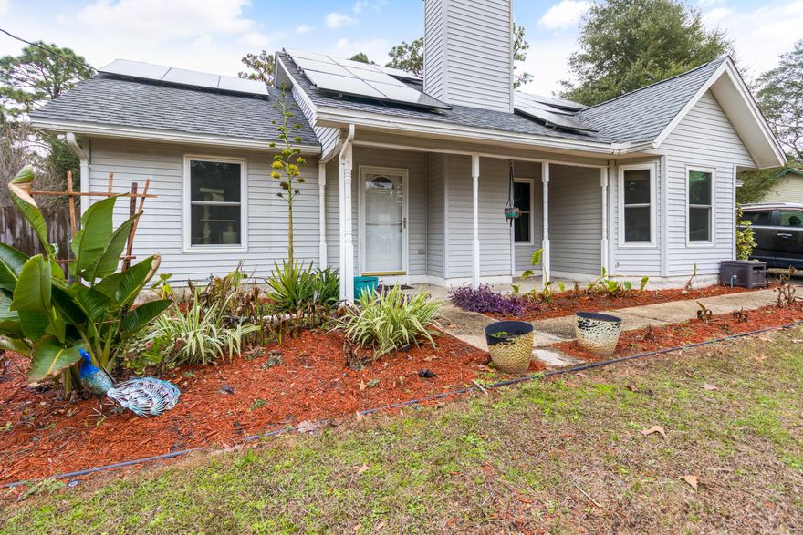 Looking for a great home with a lot of land? Look no further. This 3 bedroom 2 bathroom home is located within an easy commute to all local bases, beaches and shopping. Sitting on a half acre this home provides plenty of space for a pool, another shed, and expanding. There is a wood burning fireplace in the living room that makes for a great entertainment area. Kitchen is equipped with stainless appliances, granite counter tops, ceramic tile floors, and a spacious nook for dining. This home has newer insulated windows and porcelain tile floors throughout. Let's set up your showing today!