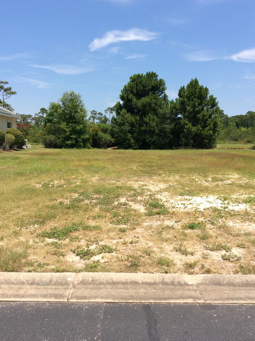 THIS IS ONE OF THE LAST AFFORDABLE BUILDING LOTS IN SUNSET BEACH. THIS LOT HAS VIEWS OF #4 FAIRWAY OF THE MARSH GOLF COURSE IN BLUEWATER BAY. UPSCALE HOMES THROUGHOUT THE GATED COMMUNITY. WATERFRONT AND BAY VIEWS TO THE WEST. LOCATED ON A QUIET CUL-DE-SAC. SUNSET BEACH HAS ITS OWN PRIVATE CLUBHOUSE, SWIMMING POOL, AND BEACH AREA FOR EXCLUSIVE USE OF RESIDENTS. SECURITY FOR THE COMMUNITY IS PROVIDED BY A GUARDED GATE.