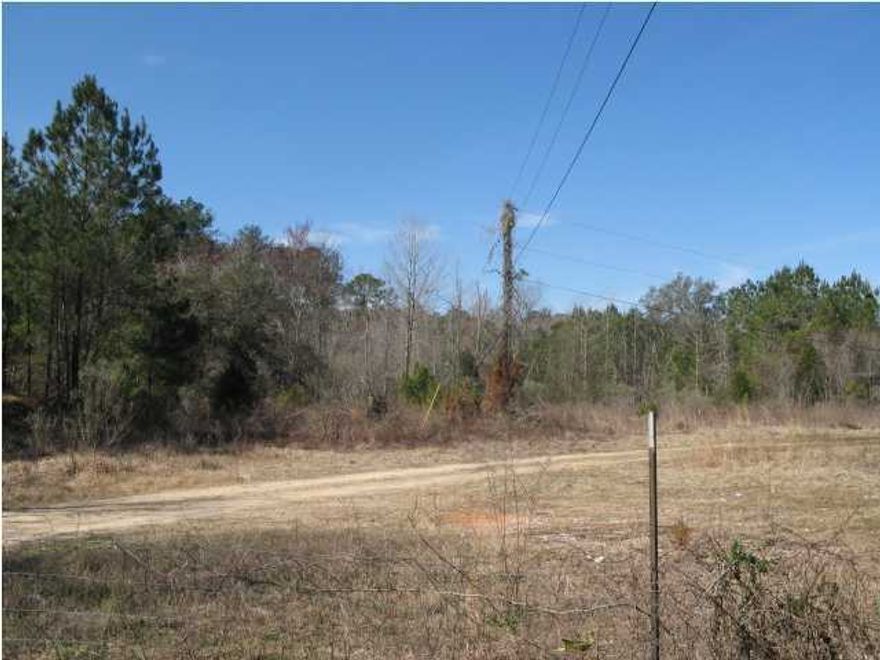 22 acres located at the S.W. corner of I-10 and Hwy. 279 south of Caryville, FL. Land is wooded and some area cleared. Rear of property backs up to the N.W. Water Management District property that borders the Choctawhatchee River. Has some wetlands. Zoned Commercial. Would make a great RV park.