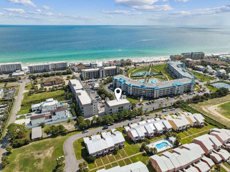 NEW PRICE! Quiet and cozy top floor, end unit. You can see the beautiful Gulf water from the front door.  Short distance across the street and you're on the beach! Welcome to your slice of coastal luxury at Alerio, a privately gated condo community located just across the street from the sugar-white sands of Miramar Beach. This beautifully appointed 2-bedroom, 2-bath residence offers an upscale, coastal-chic feel with soaring 10-foot ceilings, elegant crown molding, and a bright, open layout designed for relaxation and entertaining. The kitchen features gleaming granite countertops, stainless steel appliances, and all the modern conveniences of home. Inside, rich wood and tile flooring enhance the refined atmosphere. another perfect sunset. This condo is more than just a vacation homeit's a lifestyle.

Community amenities include a seasonally heated pool, a hot tub and a grilling area, all within the safety and privacy of a fenced, gated property. With a public beach access just across the street, your toes can be in the sand in just moments.

Conveniently located within walking distance to local favorite dining, shopping, and live entertainment. Owners enjoy the added benefit of a reserved parking space and access to a private "Owners Only" parking section, ensuring ease and exclusivity every time you arrive. Whether you're seeking a serene getaway or a smart investment, this Miramar Beach condo delivers the best of both worlds.

