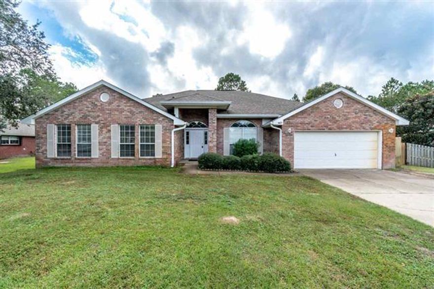 Welcome to your dream home! 20K price slash just in time for the Holidays!!! Need space for your growing family? Always want a huge Christmas tree?! Look no further! This home boasts vaulted ceilings, a split floor plan with 4 bedrooms & 3 FULL baths! New tile flooring throughout, new carpet in bedrooms, & guest baths have been freshly painted. Does your children like to help out in the kitchen, or you, yourself love to cook or bake? The large kitchen has plenty of cabinets, counter space & room to prepare meals or just hang out with family/friends while meals are being made. There is also a large pantry you will love! Master bath has large double vanity, separate shower & a water closet. This Lovely home sits on almost 1/2 an acre!