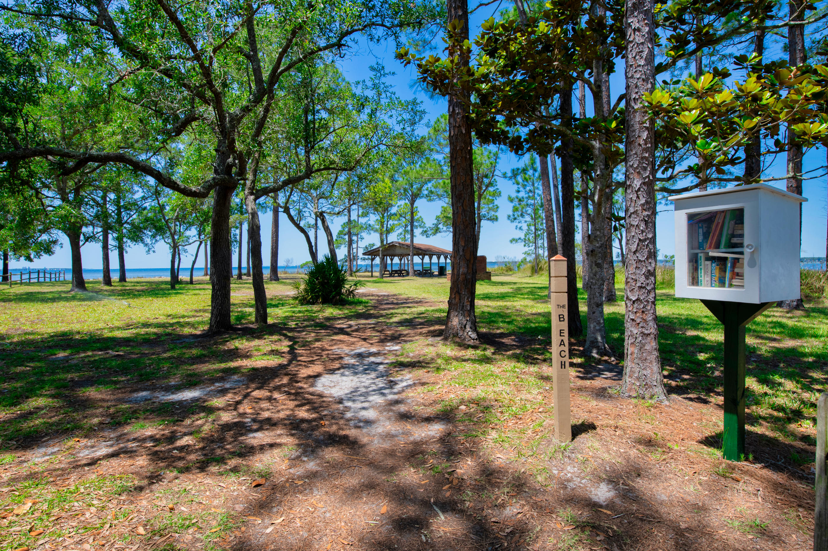 Back On Market! New Paint! New Price! What are you waiting for? This hidden gem in Raintree Estates has tons of living space, split floorplan, lovely manicured lawn with mature palms. Private Waterfront Park for the neighborhood is yours to Enjoy! Paint 2020! Roof and 50-Gallon Water Heater 2019! HVAC 2013 with extra ducting. Situated just 5 minutes from the Bay Bridge to Destin, this spacious home is ready for your touch of style! So much storage! Seller offering allowance for new flooring. Stainless steel appliances 2010, includes washer and dryer. Double paned windows are original and in good condition. Heated and Cooled Hobby or work room has shelves and double French doors with the covered lawn pump in the corner; no winterizing is ever needed.