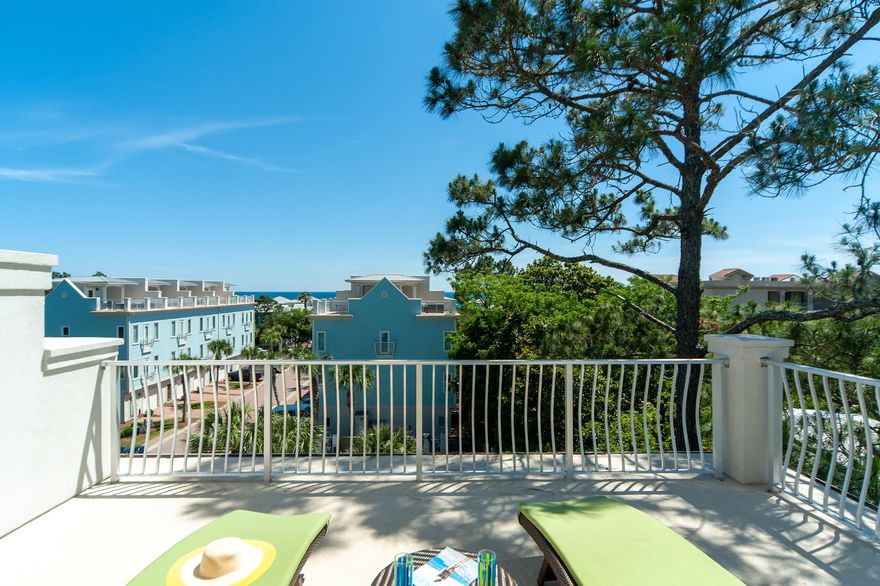 Welcome to 52 Summer Place on 30A, an updated immaculate 4-bedroom 4-bath townhome with roof top terrace, in a laid back bare-foot community with pool. This is a comfortable and convenient place for beach lovers to call home, as it is ideally located for enjoying life on 30A. After a day by the neighborhood pool which is only steps away or the beach at Ed Walline Park, take a quick easy stroll to the shopping, dining and entertainment of Gulf Place or bike to other 30A coastal towns. This well-maintained townhome has never been used as a rental; however, Summer Place boasts impressive rentals, with some same size units in Summer Place grossing over $ 59,000 in 2019, and Summer Place is a very popular vacation haven on 30A. The entire fourth floor is a roof top terrace and is one of few with great afternoon shade.  It is perfect for gathering and enjoying spectacular sunsets, gulf views and star gazing.  This beautiful townhome sits at the rear of the property on the quiet west end offering extra windows which flood the rooms in natural light.  Open the windows to hear the pool fountains and enjoy tropical breezes.  The kitchen was updated in 2019 and includes a new side by side stainless refrigerator, quartz counter tops, island with farm sink, glass tile backsplash and LED dimmable recessed lights.  All interior walls have a fresh coat of paint and the kitchen, bath and ancillary cabinetry converted from the existing dark wood to sea foam blue and stark white paint finish. You will enjoy hard surface floors throughout and central alarm system for added comfort in security.  This home is being offered mostly furnished with few exclusions and boasts several new pieces of furniture and bedding.  The Summer Place neighborhood consists of only 14 townhomes and 52 Summer Place is ideally suited for privacy yet offers views and convenience to the pool and guest parking.  The first floor includes a one car garage and leads out to a rear deck for grilling and entertainment. There's room for the kids to run and play in the side and back yards.  We invite you to see 52 Summer Place today.