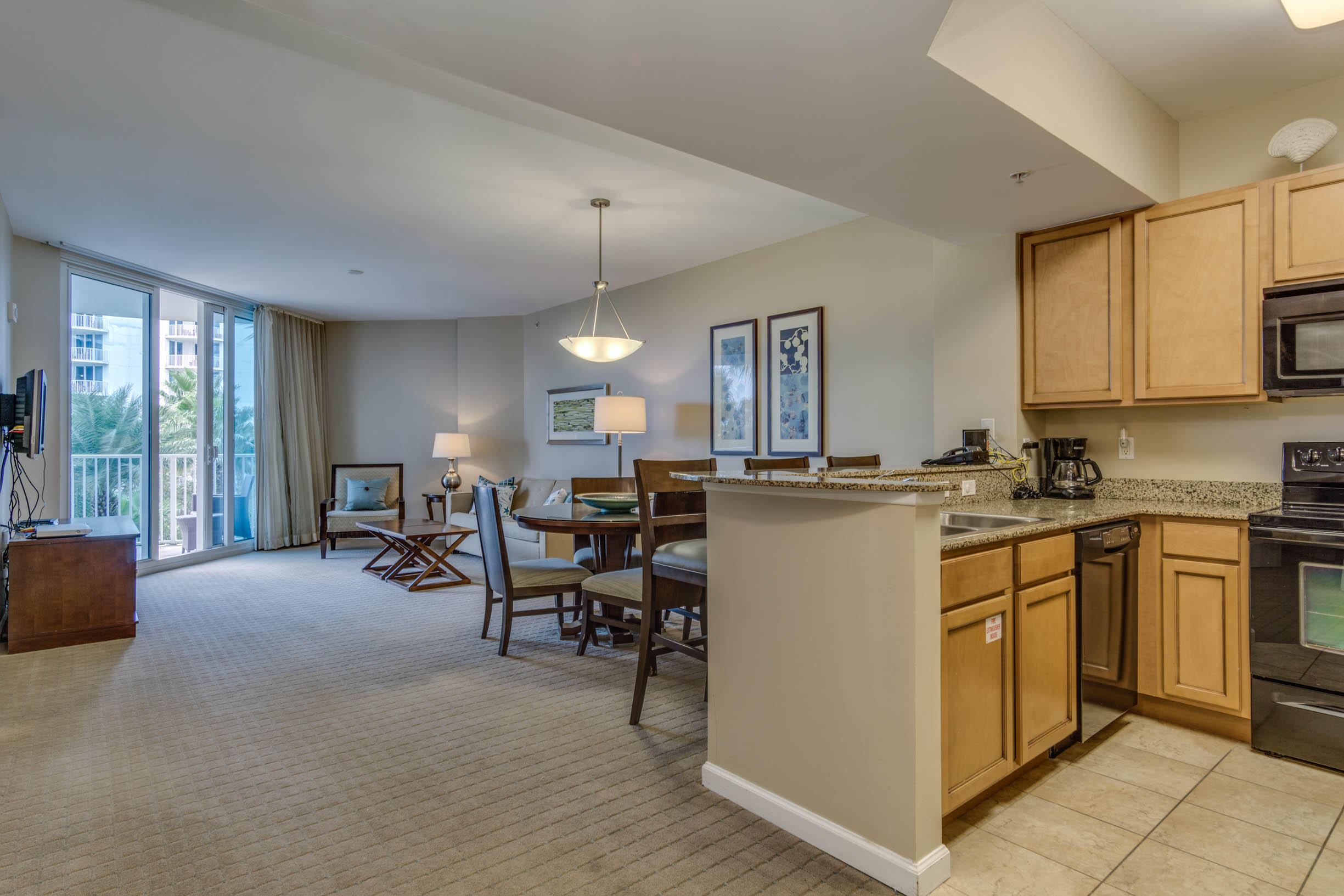 Fully furnished 2 bedroom 2 bathroom Junior Suite at the Palms of Destin located on the 3rd floor. The kitchen boasts custom cabinetry, granite countertops, and porcelain tile. The living room and master bedroom both have floor-to-ceiling sliding glass doors leading to the balcony overlooking the lagoon pool. Large garden tub in the master and a tiled walk-in shower in the guest bath.The Palms of Destin has several amenities including an on-site restaurant, luxury spa, gym, kids playground, lighted basketball and tennis courts, and covered parking