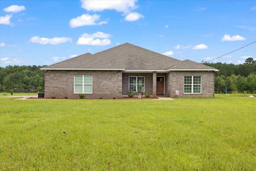 Assumable 2.375% loan option available!Room for closing cost assistance up to $15k with acceptable offer.Custom built 4/3 Homestead on 2 acres located in a serene country setting while still being close to all the necessities. Formal dining room, spacious living room with fireplace, office/formal dining area, 3 FULL bathrooms and a view unparalleled. The property has a 3 door custom barn, two out buildings used for livestock and custom livestock fencing with compost bins. Custom deck built off the family room offering views of the pond and the newly purchased above ground pool. With an acceptable offer, sellers will leave 4 year old zero turn radius mower, washer, dryer and most any other contents buyer is interested in.