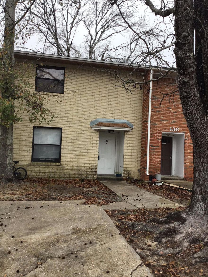 ATTENTION first time buyers & investors: Kitchen, eating area and downstairs half bath are tiled. Three upstairs bedrooms share a full bath. Walk or ride bike to nearby Pryor and Choctaw. Driveway parking in front and covered carport parking in rear. No lugging groceries in from the car in the rain.  Attached laundry room off carport. New roof going on in March.  Rent for a 3 bedroom should be $1,100+    Come take a look!