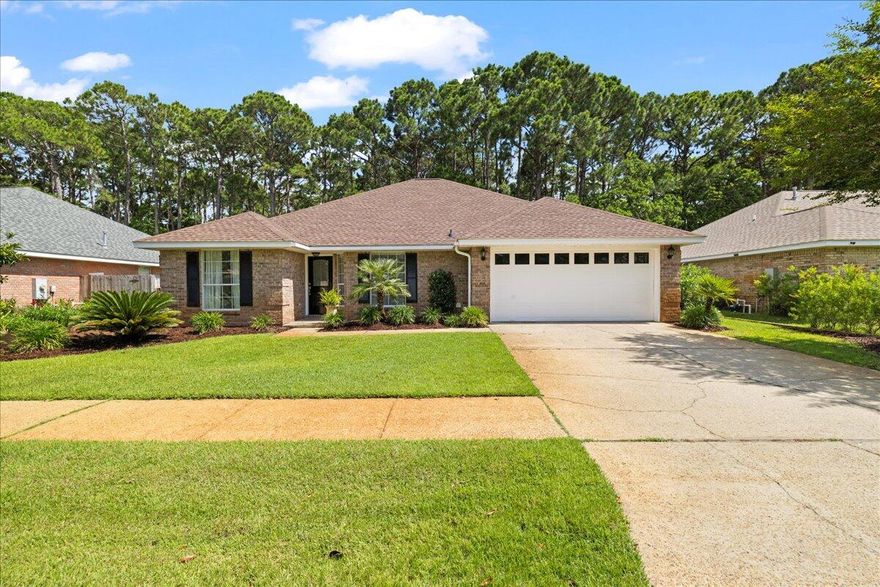 Beautifully renovated 4BR/2BA home in sought-after Indian Woods, Destin! This move-in ready gem backs up to a serene natural preserve for added privacy. Enjoy fresh paint throughout, brand new flooring, 2024 Upgraded A/C unit, 2019 hot water heater, new roof 2022 and stylish updates inside and out. The spacious living room features soaring cathedral ceilings, creating an open, airy feel. All TV's and wall furnishings are included with the sale. Interior furnishings can be purchased separately. All exterior furniture and the outdoor kitchen included in with the home. Conveniently located near beaches, dining, and shopping! A rare opportunity in a prime location!