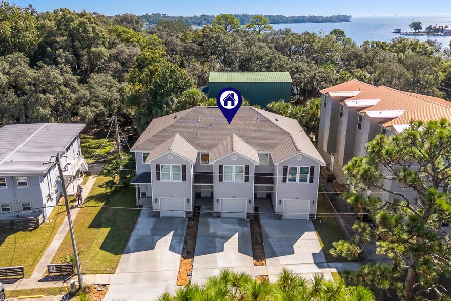 New Construction Townhomes in Valparaiso are ready!  These large townhomes offer the big three, Location, VALUE, and are brand new and only a few steps to evening walk along the water.  Builder is providing $5000 closing credit and there is no HOA.Builder has used the best finishes from LVP flooring throughout, provided new washer and dryers, and a full stainless appliance package. Bring your furniture and vehicles to enjoy a quiet neighborhood, steps from the water and 3 minutes to the Eglin gate.Large master bedroom with walk in closet, double vanity, separate shower and tub.  Additional bedrooms offer space and easy of access to second full bath upstairs.  Laundry room is on the bedroom level for ease of use.These units will go fast schedule your showing.