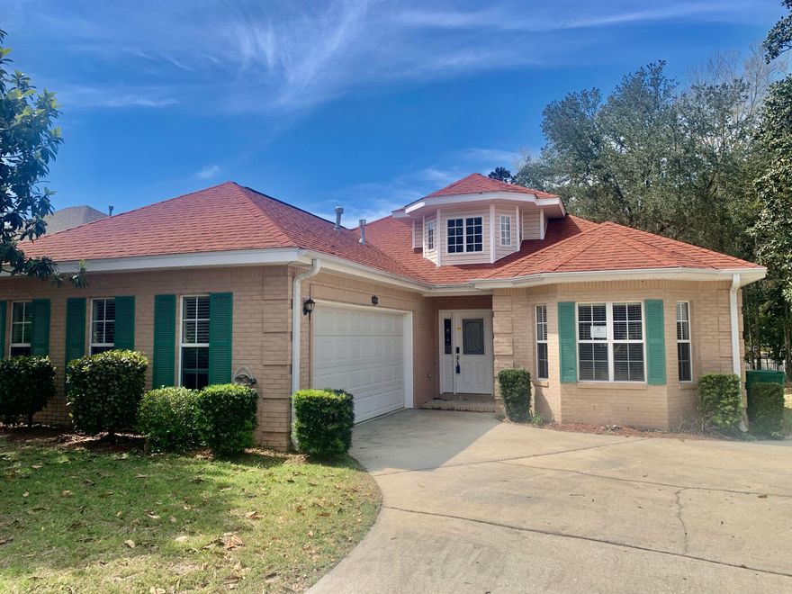 REO.  Located in Magnolia Plantation, a Gated Community, this all Brick home has 3 Spacious Bedrooms with a Split Floor Plan.  Vaulted Ceilings in the Huge Living Area with Built ins and a Gas Fireplace.  The Kitchen has loads of Cabinet Space and a Gas Range for Cooking.  This home has a fenced lot with a Large Deck for entertaining and relaxing.  Easy commute to Eglin AFB and Duke Field as well as Boating, Fishing, Beaches, and Golfing.  Restaurants and Shopping are just a hop, skip and a jump over the Mid Bay Bridge to Destin.