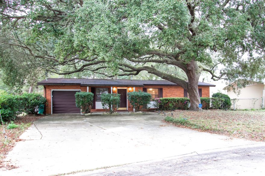 AWESOME set up for extended family living! Main house has 3 bedrooms and full bath. Large eat in kitchen and 1 car garage. All tile flooring throughout, new window blinds throughout and ceiling fans in all bedrooms. Security system in place. Lots of closets/cabinets/shelving. APARTMENT has a kitchen/dining/living combo. Nice size bedroom and full bathroom. Many possibilities here. Lawn pump and sprinkler system. Large fenced backyard with open and covered patios. Solid all brick home for easy maintenance. Great location...very convenient to both bases, schools, hospital, restaurants and shopping. Will sell quickly. Call to view today! Please have your offer accompanied by your loan letter or POF. Make this one your HOME SWEET HOME before someone else does. Thanks!