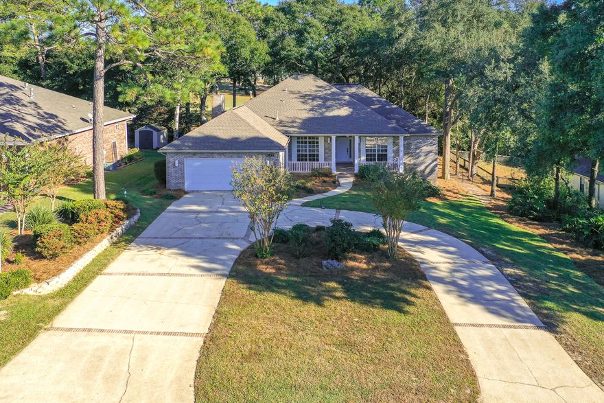 This beautiful home is situated on a large lot just off of the 2nd tee of the private Rocky Bayou County Club Estates Golf Course!With  over 2,600 square feet, this 4 bedroom, 2 bath home offers a formal dining room, a formal living room with a gas fireplace and a bar, a family room, a spacious kitchen including plenty of newly painted cabinets, granite countertops, tile backsplash and a stainless steel 5 burner gas stove along with  a stainless steel microwave and dishwasher.Enjoy the beautiful views of the serene backyard and the fairway from the spacious screened in wooden deck complete with a built in hot tub!Both the kitchen and the master bedroom have separate entrances to access the porch.The spacious