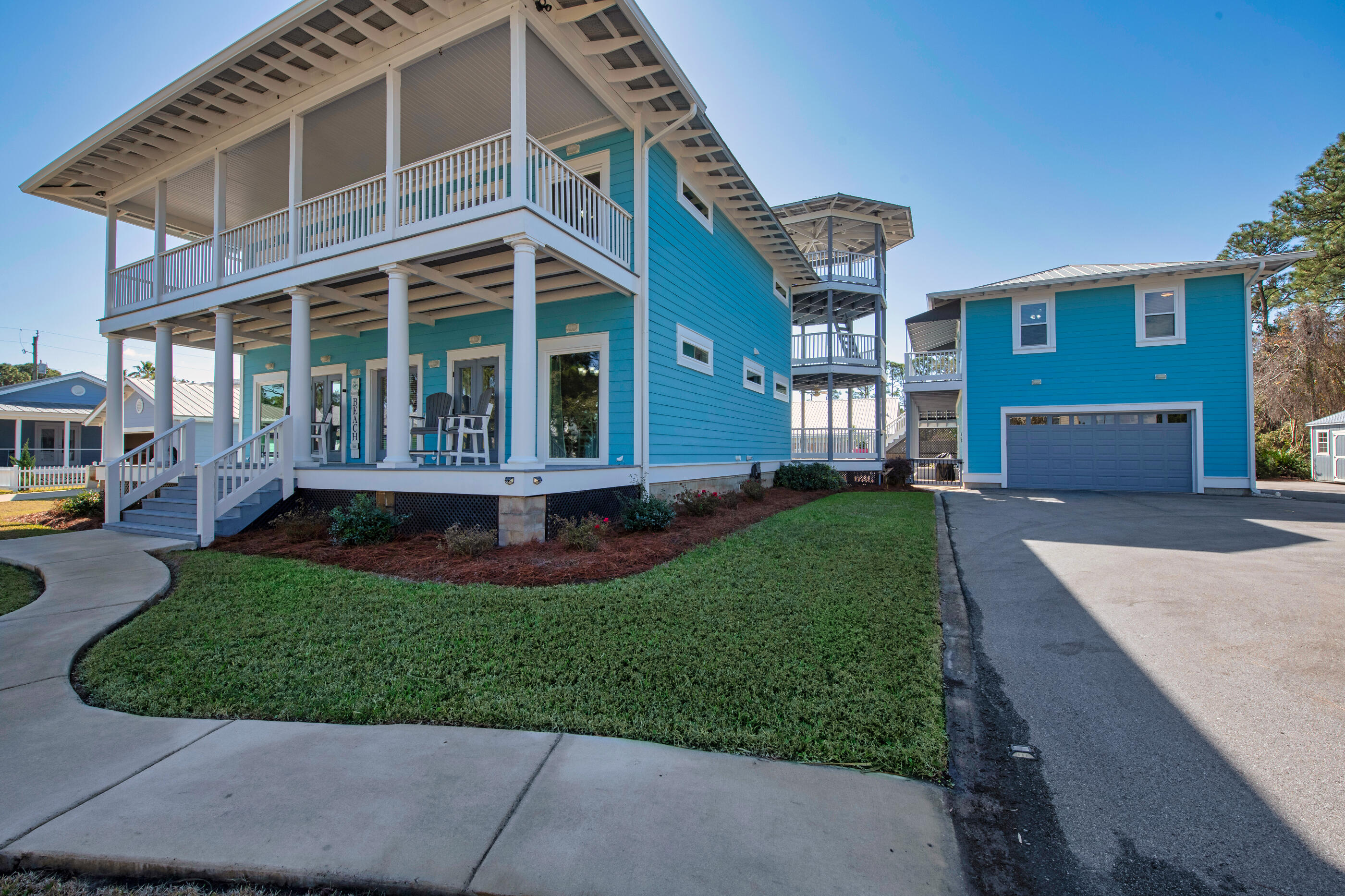 Beautiful home with bay views and 5 minutes to the gulf by car or golf cart! Home comes fully furnished. Main house offers 4 bedrooms, 3 bathrooms, and all bedrooms opening to large porches. Nice hardwood floors throughout with tiled baths. Whole home Generac generator and saltwater pool with heater are just a few great extra features for this home. 2 car detached garage with 1 bedroom and 1 bathroom apartment above. Plenty of parking. Across the street is a park that includes a boat ramp. No HOA or covenants. New carpet 2020. 3 new AC/Furnaces 2023. Exterior paint 2023. All new impact windows 2024.