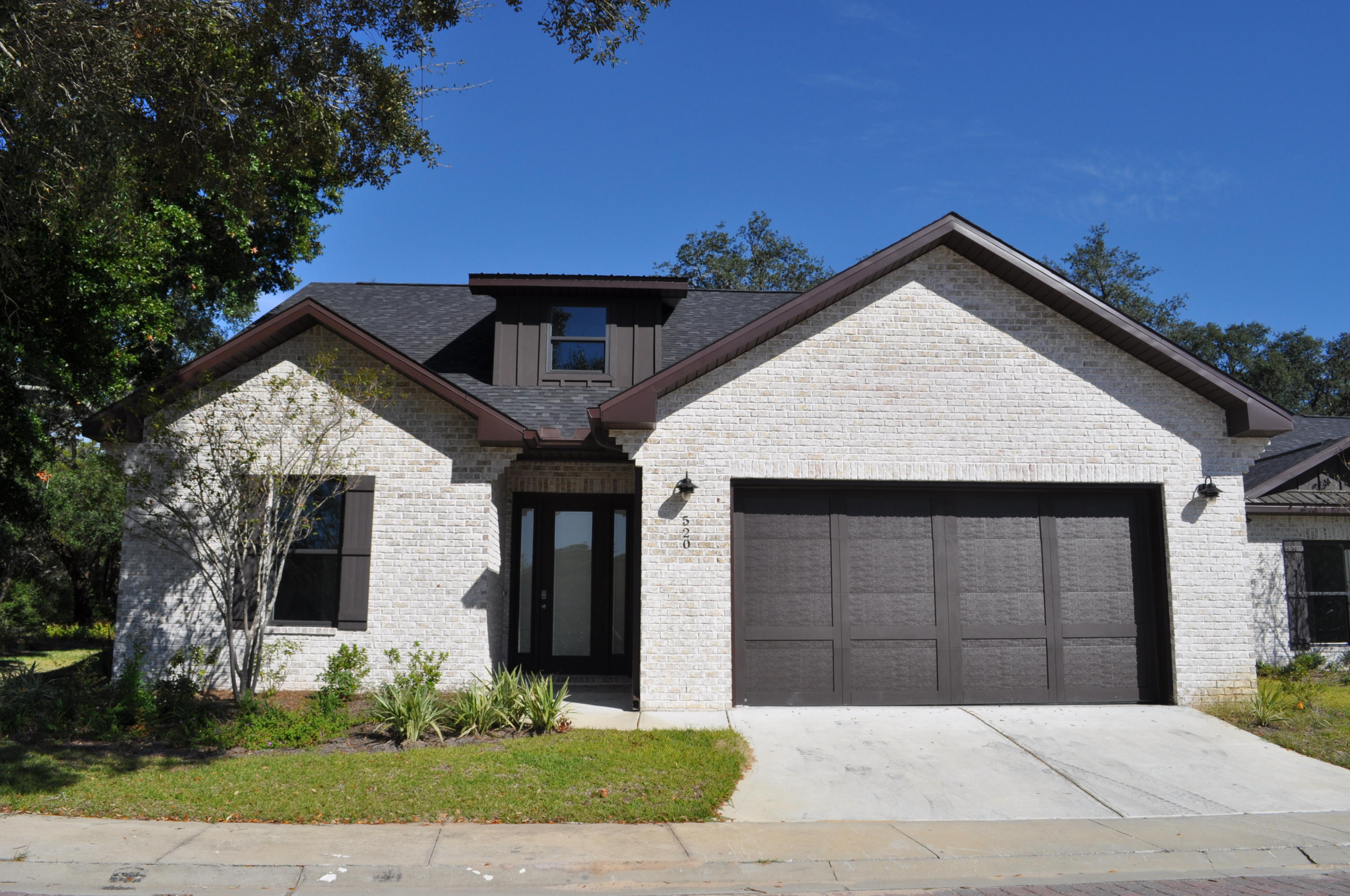 NEW CONSTRUCTION in DESTIN!! IDEAL LOCATION!! Enjoy close proximity to the Destin Harbor District, Destin Elementary School, and Clement Taylor Park overlooking Crab Island. Hemingway Subdivision delivers a quaint community with paver streets, lush landscaping nestled in the perfect location. Interior features include plank tile flooring throughout the main living area, custom tiled bathrooms with tiled surrounds, granite countertops, stainless appliances, high-grade mill work, tall ceilings, and two car garage. Make Hemingway your Destin address today!!