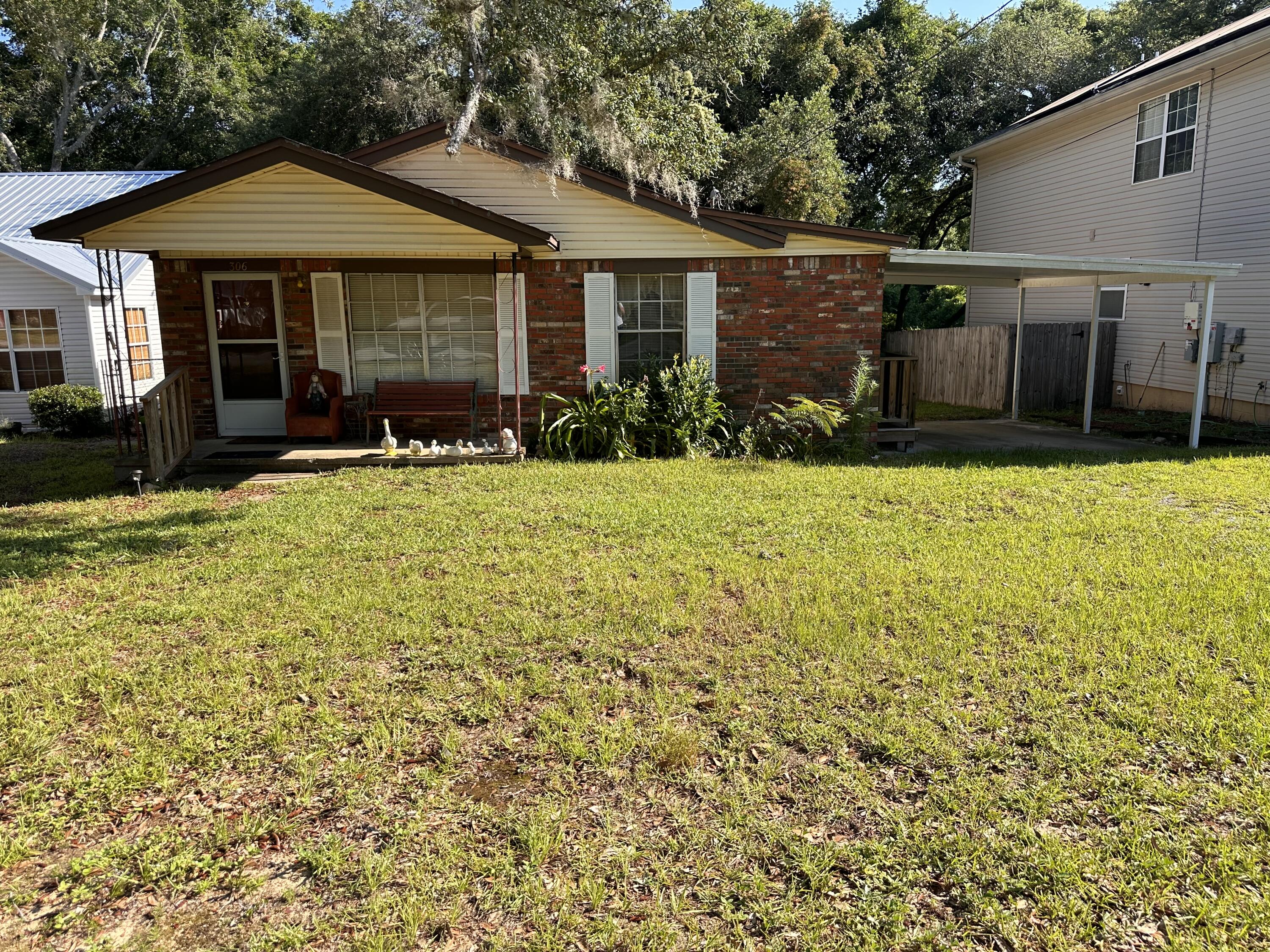 Charming 3-bedroom, 2-bathroom home with immense potential! Nestled on a .16-acre lot that backs up to a serene creek, this property offers a tranquil setting with beautiful natural surroundings. Located within walking distance to the local elementary school, it's perfect for anyone looking to create their dream home in a convenient location. Though in need of some repairs and updates, this home provides a fantastic opportunity for those with a vision to customize and make it their own. Don't miss the chance to transform this hidden gem into a true masterpiece!