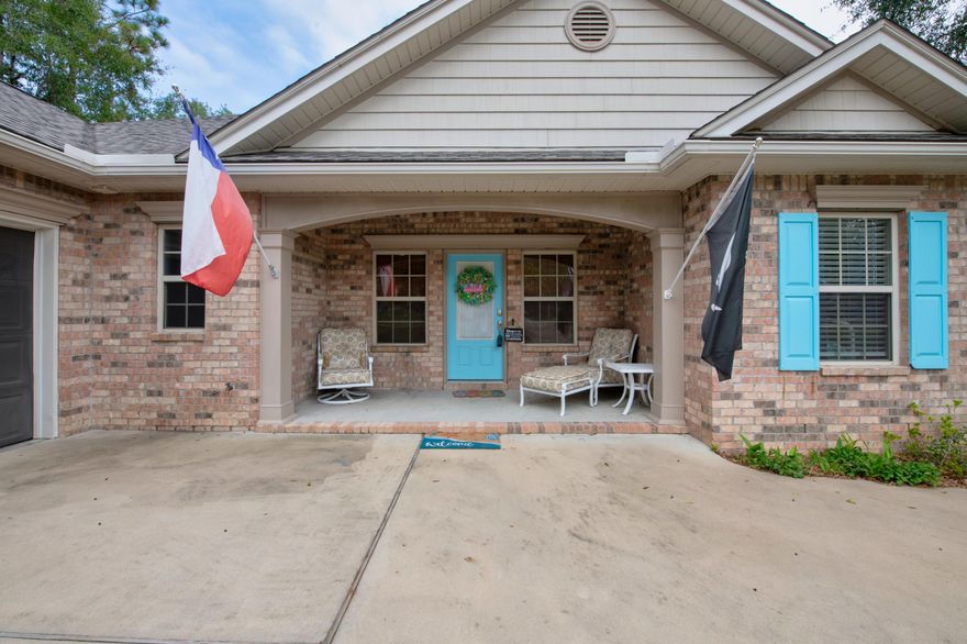 This custom built home in the serene setting of Camillia Cove subdivision is ready for new owners. The covered front porch is the perfect spot to enjoy your morning coffee or visit with friends.   As you enter the front door you are greeted by the warmth of the dark hardwood floors and open concept living/kitchen and dining areas.  The living room has built in bookshelves. The spacious kitchen has plenty of cabinets and the open concept is perfect for entertaining.  The master bedroom has room for all your furniture and the master bath has dual vanities, a walk in closet, a tiled shower and a soaking tub,  Two of the bedrooms share a Jack and Jill bathroom.  Situated on a half acre lot the yard offers ample  space for a pool, or just space to enjoy nature.