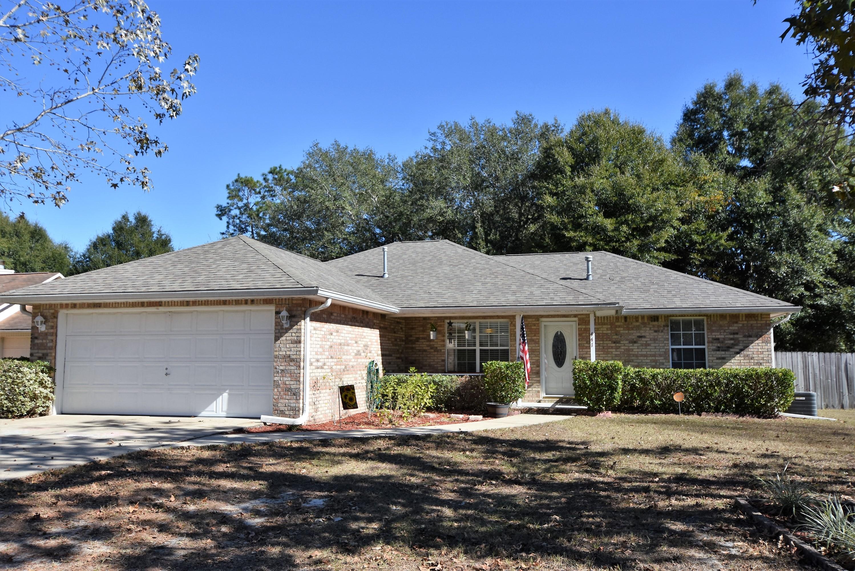 South of I-10 and on a large level lot with a WORKSHOP in the fenced in back yard! PLUS....a 1 year home warranty and Seller is offering to help with most of your closing costs! 1300+ sq.ft. Split Bedroom Floor Plan with a large Florida Room overlooking the back yard with mature trees! Stainless Steel appliances with a GAS range, pantry, and breakfast bar. Tile and laminate wood flooring throughout with carpet in the bedrooms. Master Bedroom has a large walk-in-closet with access to the Florida Room. New Roof and Workshop added in 2011. Make this home yours today! Home Warranty value of $400. Closing Costs assistance provided by seller do not include: credit report, optional inspections, 1st year homeowners insurance, and escrow account set up. Please verify information important to you.