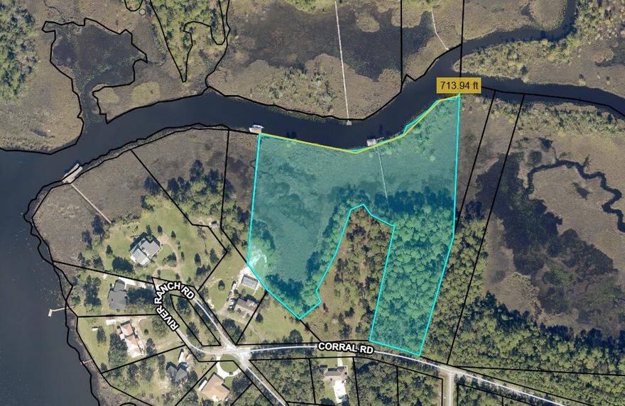 Remarkable large property with lots of uplands, extensive wildlife buffers, and an existing dock! This is your chance to build a private, waterfront estate but begin enjoying it nearly immediately in a natural, and old Florida setting! Survey and wetlands line available. Dock is shared with adjoining owner, please call for details. Lot is large enough for a lot split into two lots!