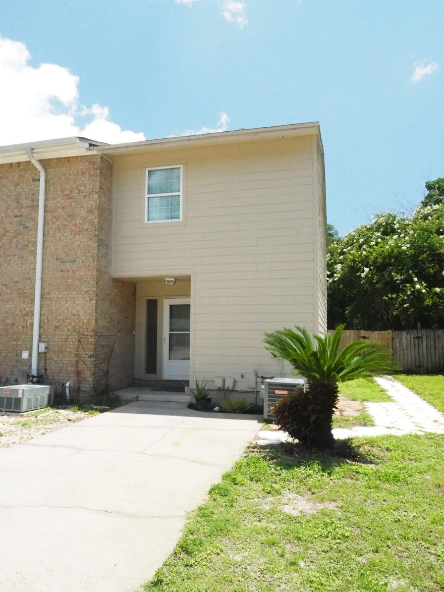 Immaculate two bedroom end-unit townhome ready for move-in. This freshly painted home features new carpet, spacious rooms, ceiling fans throughout, and renovated bathrooms and kitchen. Updated siding (concrete board/plank), windows, roof (new roof to be installed before closing), air conditioner,  and water heater (installed in 2020). The seller moved the laundry area to its own room giving more space to the kitchen area. Stainless appliances and granite counters in kitchen. Spacious privacy fence back yard with patio, storage shed and lawn pump. Stepping stones lead from driveway to back yard. Since this is an end unit, the driveway is extra long and side yard has additional space for parking boat or rv. No HOA.
