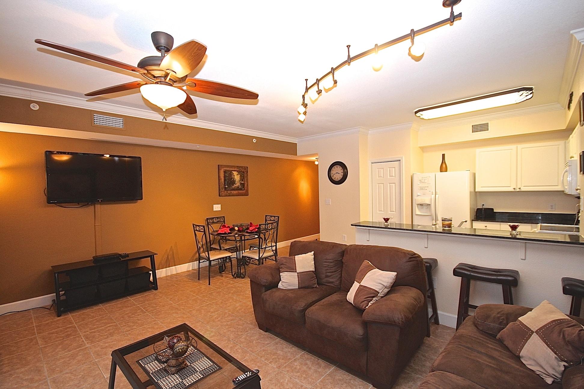 Don't miss out on this pristine 2BR/3BA unit. Unit 2413 features matching tile throughout the whole unit, black out curtains, upgraded light fixtures and granite countertops in the kitchen. This unit is priced to sell and will not last long. Tidewater is known for having one of the best locations in PCB and offers tons of amenities that everyone can enjoy. Tidewater features 636 ft of Gulf frontage, a large fitness center, saunas, steam rooms, an owners lounge, two game rooms, a large movie theater, a restaurant, a tiki bar, convention/conference room, covered parking garage, covered sky walk, two outdoor pools, one indoor heated pool, four hot tubs, security and a market that sells Starbucks coffee, ice-cream, beach toys and more! This unit is priced to sell and will not last long so make