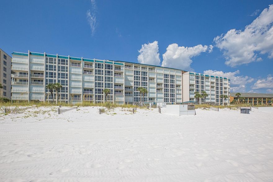 Enjoy Amazing Views from this Beautifully Renovated Two Bedroom Condo. You will be immediately impressed as you walk through the front door. The kitchen features white, shaker cabinets, Quartz Countertops and stainless steel appliances. The dining room has a coffered ceiling while wood plank tile floors are found in the main living areas. The impeccable furnishings are included. Grand Mariner is one of Destin's premier residential, beachfront communities. The property is gated, has a beachfront pool, fitness room, and direct beach access. Schedule your exclusive showing today!