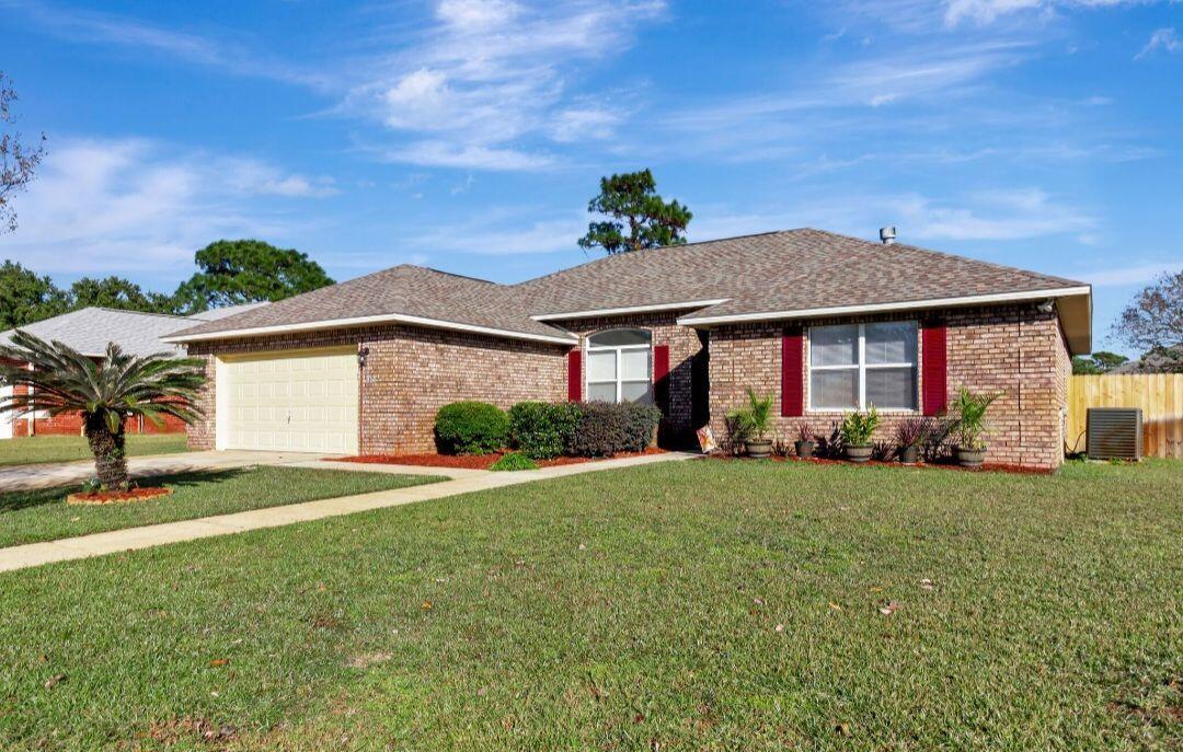 Welcome to the beautiful 4 bedroom home in Gulf Breeze, FL! This spacious house is perfect for those seeking a comfortable and convenient living experience. With 4 bedrooms and 2 bathrooms, there is plenty of space for everyone. The fenced yard provides a safe and private outdoor area, perfect for enjoying the Florida sunshine. The house is located in a neighborhood with sidewalks, making it easy to take a stroll or go for a jog. One of the best features of this home is its proximity to the beach - just minutes away!