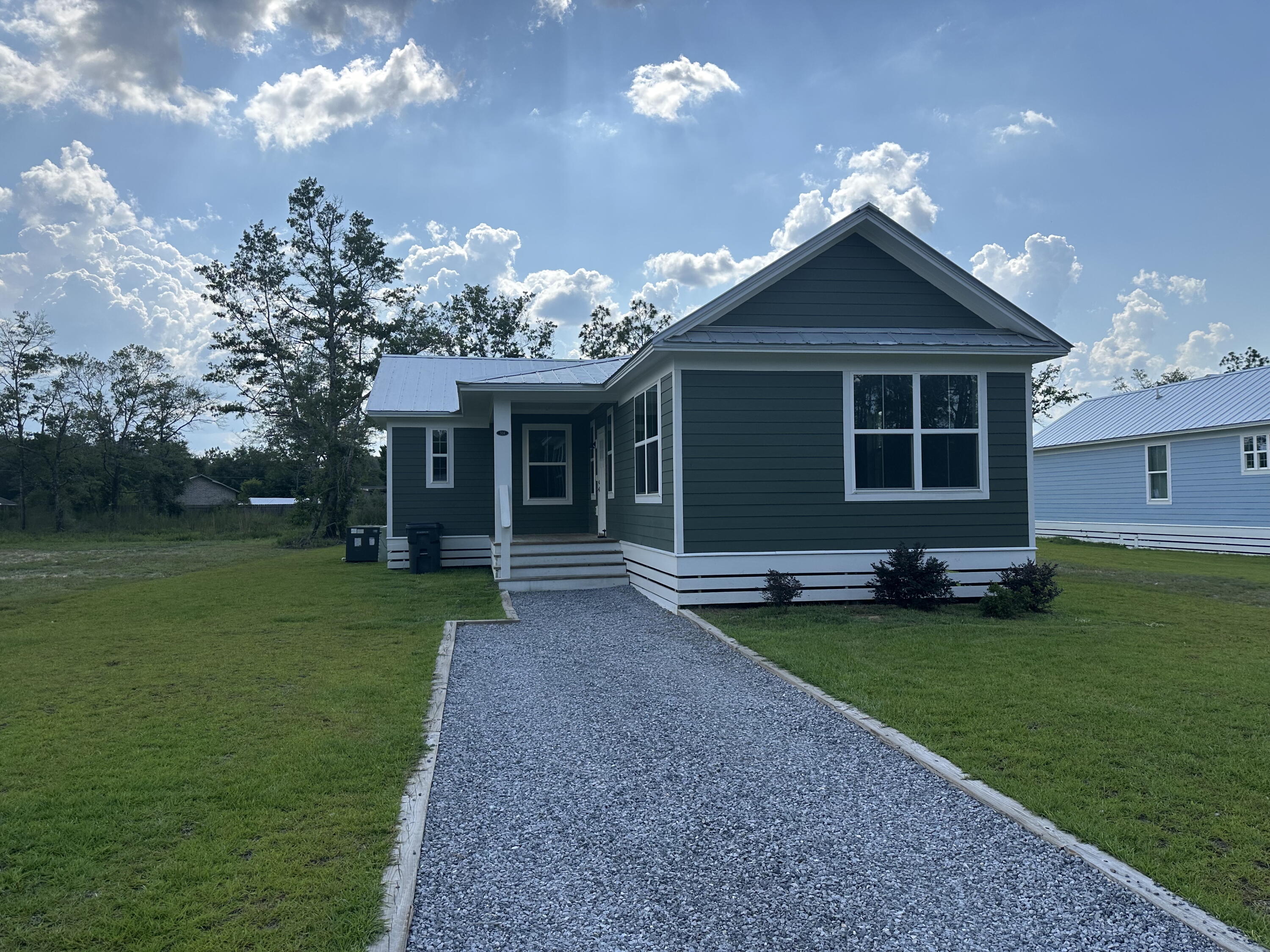 Ready For A New Tenant! 3 bedroom 2 bathroom piling home. This build features vinyl plank flooring throughout the entire home with an open-floor layout. In the kitchen, there are stainless steel appliances, shaker style cabinets & quartz countertops. The master bathroom has a stunning tiled shower and walk-in closet. Call today for a showing!